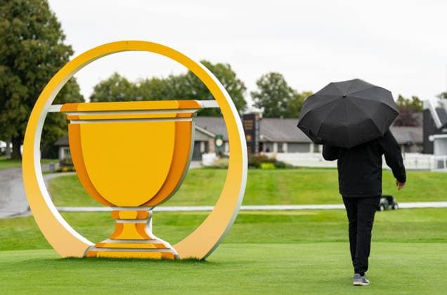 September 23, 2024, Montreal, Pq, CANADA: A man walks on the course in the rain during a practice session at the Presidents Cup golf tournament at the Royal Montreal Golf Club, Monday, Sept. 23, 2024 in Montreal. Canada News - September 23, 2024  - ZUMAc35_ 20240923_zaf_c35_034 Copyright: xChristinnexMuschix
