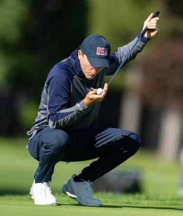 September 24, 2024, Montreal, Canada: United States team member RUSSELL HENLEY blows on his ball as he prepares to putt on the fourth hole during practice at the Presidents Cup golf tournament at the Royal Montreal Golf Club. Golf 2024: Presidents Cup: Pre-Tournament  - ZUMAc35_ 20240924_zaf_c35_056 Copyright: xChristinnexMuschix