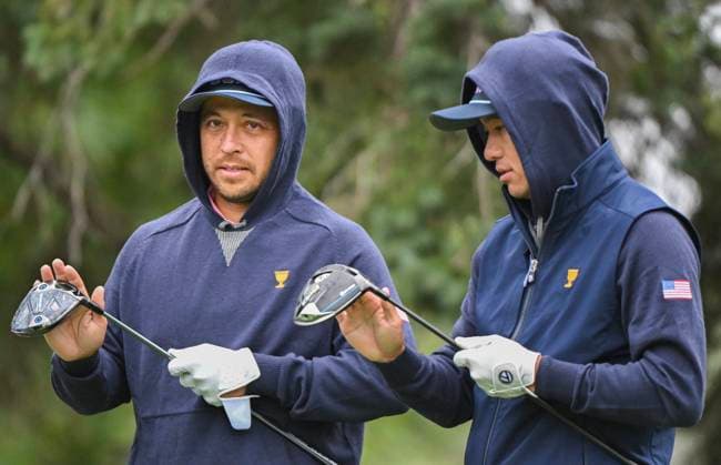 September 25, 2024, Montreal, Pq, Canada: United States team members Xander Schauffele, left, and Collin Morikawa wipe their drivers during a practice round at the Presidents Cup at Royal Montreal Golf Club in Montreal, Wednesday, September 25, 2024. Canada News - September 25, 2024 - ZUMAc35_ 20240925_zaf_c35_014 Copyright: xGrahamxHughesx