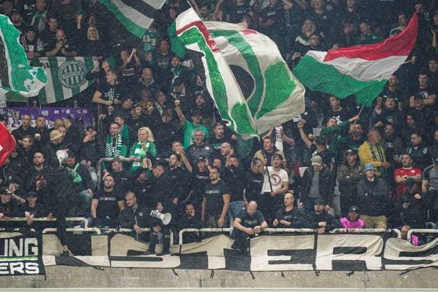 2024-09-25 RSC Anderlecht v Ferencvaros - UEFA Europa League 2024 25 League Phase MD1 BRUSSELS, BELGIUM - SEPTEMBER 25: fans of Ferencvarosi TC with flags during the UEFA Europa League 2024 25 League Phase MD1 match between RSC Anderlecht and Ferencvaros at RSC Anderlecht Stadium on September 25, 2024 in Brussels, Belgium. Brussels RSC Anderlecht Stadium Belgium Content not available for redistribution in The Netherlands directly or indirectly through any third parties. Copyright: xJorisxVerwijstx
