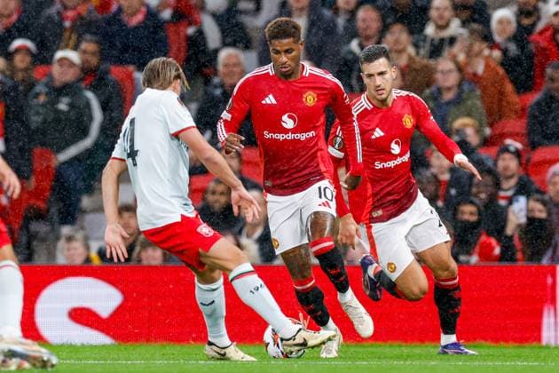 Marcus Rashford of Manchester United, ManU dribbles with the ball, defends by Sem Steijn of FC Twente , UEFA Europa League 2024 25 League Phase MD1, Manchester United v FC Twente, Old Trafford, September 25, 2024, Manchester, England.
