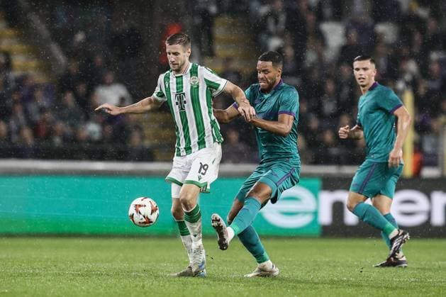 Ferencvaros s Barnabas Varga and Anderlecht s Mathias Jorgenson Zanka fight for the ball during a soccer game between Belgian RSC Anderlecht and Hungarian Ferencvarosi TC, on Wednesday 25 September 2024 in Brussels, on the opening day of the League phase of the UEFA Europa League tournament. BRUNOxFAHY  x101371768x