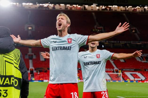 Michel Vlap of FC Twente, Bart van Rooij of FC Twente celebrating the draw , UEFA Europa League 2024 25 League Phase MD1, Manchester United, ManU v FC Twente, Old Trafford, September 25, 2024, Manchester, England.