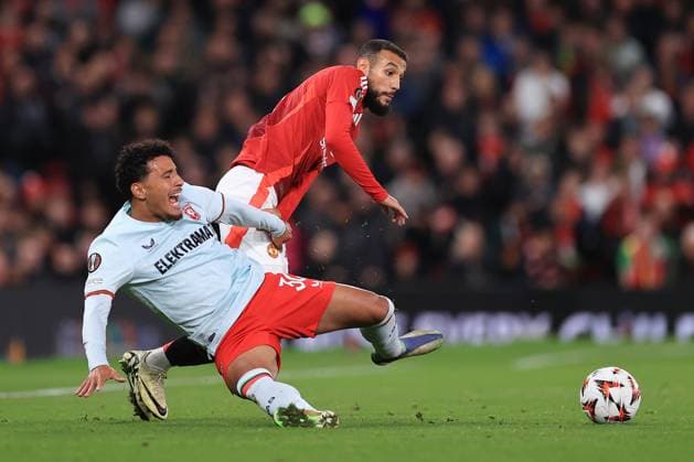 Football - UEFA Europa League - League Phase - Manchester United, ManU v FC Twente 25th September 2024 - UEFA Europa League - League Phase - Manchester United v FC Twente - Sayfallah Ltaief of FC Twente battles with Noussair Mazraoui of Manchester United - Photo: Simon Stacpoole Offside. Manchester UK Copyright: xSimonxStacpoolexOffside
