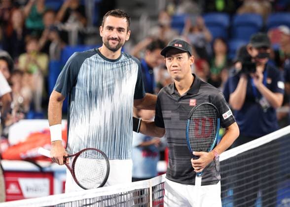 Marin Cilic (CRO) und Kei Nishikori posen am Netz for Spielbeginn, Kinoshita Group Japan Open Tennis Championships, Tokyo, Japan Copyright: xJuergenxHasenkopfx