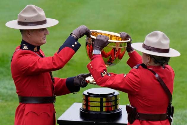 September 26, 2024, Montreal, Pq, Canada: Royal Canadian Mounted Police Mounties bring out the Presidents Cup ahead of the start of the first round four-ball match at the Presidents Cup golf tournament at the Royal Montreal Golf Club in Montreal, Thursday, Sept. 26, 2024. Canada News - September 26, 2024  - ZUMAc35_ 20240926_zaf_c35_009 Copyright: xFrankxGunnx