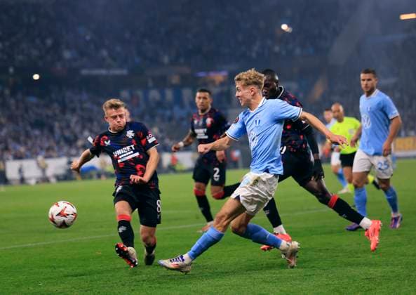 Malmö s Hugo Bolin (R) and Rangers Connor Barron during the Europa League football match between Malmö FF and Rangers FC at Malmö New Stadium in Malmo, Sweden September 26, 2024. MALMÖ SVERIGE ttexport x10600x