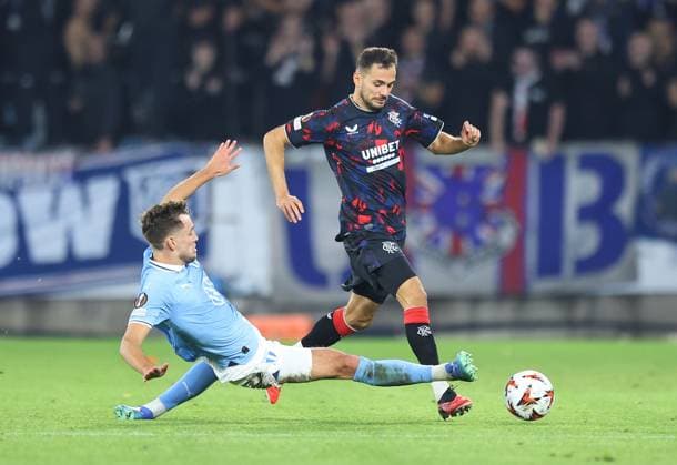 Nedim Bajrami of Rangers is fouled by Colin Rosler of Malmo Malmo v Rangers, UEFA Europa League, Group Stage, Football, Eleda Stadion, Malmo, Sweden, 26 Sep 2024 EDITORIAL USE ONLY No use with unauthorised audio, video, data, fixture lists, club league logos or live services. Online in-match use limited to 120 images, no video emulation. No use in betting, games or single club league player publications. Copyright: xMichaelxZemanek Shutterstockx 14739047q
