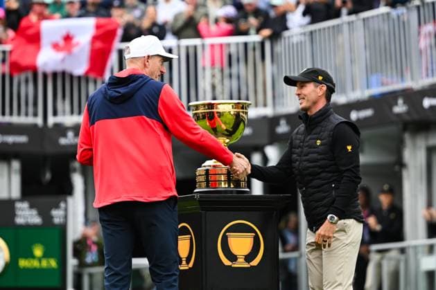 MONTREAL, QC - SEPTEMBER 26: Team USA captain Jim Furyk shakes International Team captain Mike Weir hand on first hole at the 2024 Presidents Cup on September 26, 2024 at The Royal Montreal Golf Club in Montreal, QC (Photo by David Kirouac Icon Sportswire) GOLF: SEP 26 Presidents Cup EDITORIAL USE ONLY Icon240926003