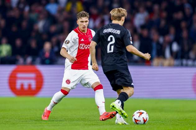 AMSTERDAM, 26-09-2024 , JohanCruijff Arena, football, UEFA Europa League, season 2024 2025, during the match Ajax - Besiktas, Ajax player Mika Godts and Besiktas player Jonas Svensson Ajax - Besiktas  x26342709x Copyright: