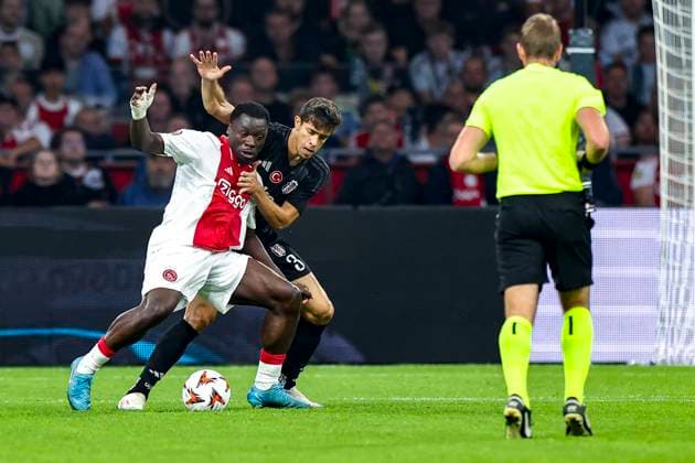 AMSTERDAM, 26-09-2024 , JohanCruijff Arena, football, UEFA Europa League, season 2024 2025, during the match Ajax - Besiktas, Ajax player Brian Brobbey and Besiktas player Gabriel Paulista Ajax - Besiktas  x26342809x Copyright: