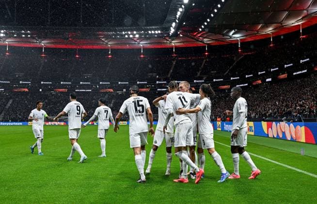 26.09.2024, xpsx, Fussball UEFA Europa League, Eintracht Frankfurt - Viktoria Pilsen v.l. celebrate the goal, Torjubel zum 1:0 Torschütze Hugo Ekitike (Eintracht Frankfurt) (DFL DFB REGULATIONS PROHIBIT ANY USE OF PHOTOGRAPHS as IMAGE SEQUENCES and or QUASI-VIDEO) emspor Frankfurt