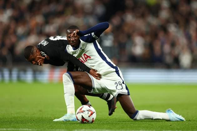 26th September 2024; Tottenham Hotspur Stadium, London, England; UEFA Europa League Football, Tottenham Hotspur versus Qarabag; Pape Matar Sarr of Tottenham Hotspur keeps possession of the ball from Patrick Andrade of Qarabag  ActionPlus12696741 ShaunxBrooks