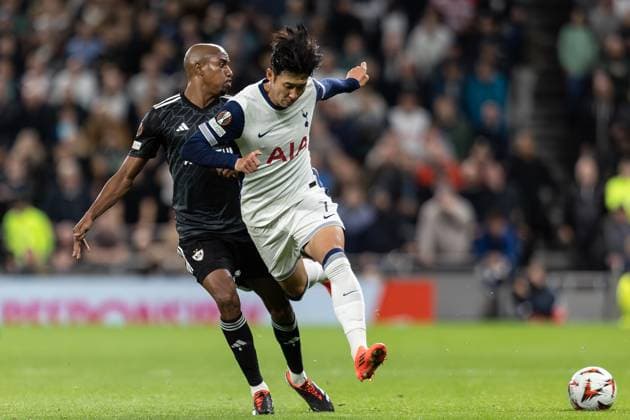 Tottenham Hotspur v FK QARABAG Europa League 26 09 2024. QarabaÄü midfielder Julio Romao (q6) tackles Tottenham Hotspur forward Son Heung-Min (7) during the Europa League match between Tottenham Hotspur and FK Qarabag at Tottenham Hotspur Stadium, London, United Kingdom on 26 September 2024. Editorial use only , Copyright: xIanxStephenx PSI-20487-0014