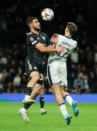 Mikey Moore of Tottenham Hotspur competes with Abbas Hüseynov of Qarabag Tottenham Hotspur v Qarabag, UEFA Europa League, Group Stage, Football, Tottenham Hotspur Stadium, London, UK, 26 Sep 2024 EDITORIAL USE ONLY No use with unauthorised audio, video, data, fixture lists, club league logos or live services. Online in-match use limited to 120 images, no video emulation. No use in betting, games or single club league player publications. Copyright: xAndrewxFosker Shutterstockx 14739040aw