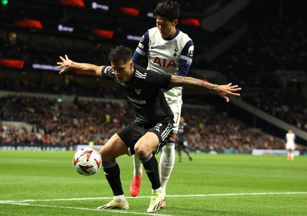 London, England, 26th September 2024. Qarabag™s Matheus Silva and Tottenham™s Son Heung-min challenge for the ball during the UEFA Europa League match at the Tottenham Hotspur Stadium, London. Picture credit should read: Paul Terry Sportimage EDITORIAL USE ONLY. No use with unauthorised audio, video, data, fixture lists, club league logos or live services. Online in-match use limited to 120 images, no video emulation. No use in betting, games or single club league player publications. SPI-3334-0066