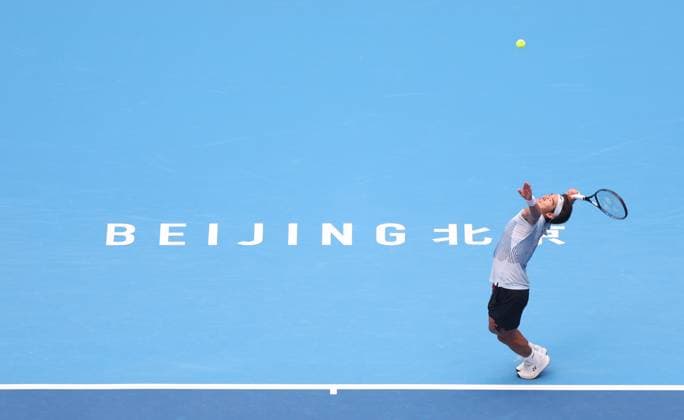 (240927) -- BEIJING, Sept. 27, 2024 -- Bu Yunchaokete of China serves during the men s singles first round match against Shang Juncheng of China at 2024 China Open tennis tournament in Beijing, capital of China, Sept. 27, 2024. ) (SP)CHINA-BEIJING-TENNIS-CHINA OPEN-MEN S SINGLES-FIRST ROUND (CN) BaixXuefei 