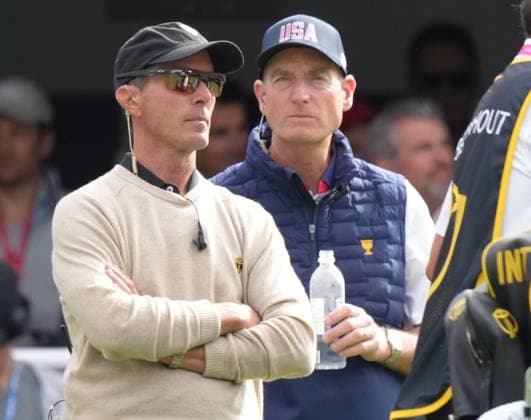 September 27, 2024, Montreal, Pq, Canada: International team captain Mike Weir, left, and USA captain Jim Fury watch the opening tee offs during second round foursome match at the Presidents Cup golf tournament at Royal Montreal Golf Club in Montreal, Friday, Sept. 27, 2024. Golf 2024: Presidents Cup: Round Two  - ZUMAc35_ 20240927_zaf_c35_067 Copyright: xNathanxDenettex