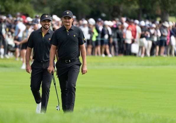 September 27, 2024, Montreal, Pq, CANADA: International team members Jason Day of Australia, left, and Christiaan Bezuidenhout of South Africa, walk up the fairway on the first hole during their second round foursome match at the Presidents Cup golf tournament at the Royal Montreal Golf Club, in Montreal, Friday, Sept. 27, 2024. Canada News - September 27, 2024 - ZUMAc35_ 20240927_zaf_c35_108 Copyright: xChristinnexMuschix