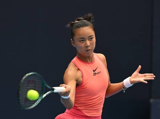 (240928) -- BEIJING, Sept. 28, 2024 -- Yuan Yue of China returns a shot during the women s singles second round match between Karolina Muchova of the Czech Republic and Yuan Yue of China at 2024 China Open tennis tournament in Beijing, capital of China, Sept. 28, 2024. ) (SP)CHINA-BEIJING-TENNIS-CHINA OPEN-WOMEN S SINGLES-SECOND ROUND (CN) ZhangxLong 