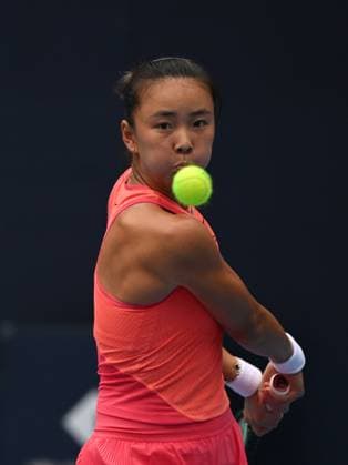 (240928) -- BEIJING, Sept. 28, 2024 -- Yuan Yue of China returns a shot during the women s singles second round match between Karolina Muchova of the Czech Republic and Yuan Yue of China at 2024 China Open tennis tournament in Beijing, capital of China, Sept. 28, 2024. ) (SP)CHINA-BEIJING-TENNIS-CHINA OPEN-WOMEN S SINGLES-SECOND ROUND (CN) ZhangxLong 