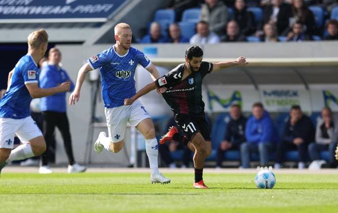 28.09.2024, xdcx, Fussball 2. Bundesliga, SV Darmstadt 98 - 1. FC Magdeburg, emonline, emspor, despor, v.l., Kai Klefisch (SV Darmstadt 98), Mohammed El Hankouri (1. FC Magdeburg) DFL DFB REGULATIONS PROHIBIT ANY USE OF PHOTOGRAPHS AS IMAGE SEQUENCES AND OR QUASI-VIDEO.