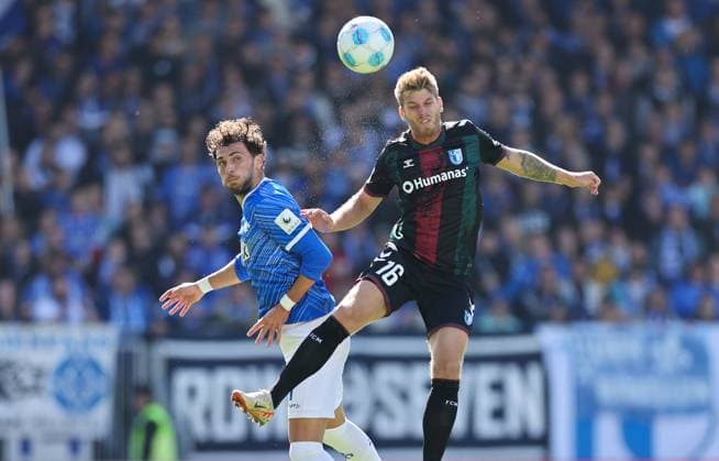 28.09.2024, xdcx, Fussball 2. Bundesliga, SV Darmstadt 98 - 1. FC Magdeburg, emonline, emspor, despor, v.l., Fraser Hornby (SV Darmstadt 98), Marcus Mathisen (1. FC Magdeburg) DFL DFB REGULATIONS PROHIBIT ANY USE OF PHOTOGRAPHS AS IMAGE SEQUENCES AND OR QUASI-VIDEO.