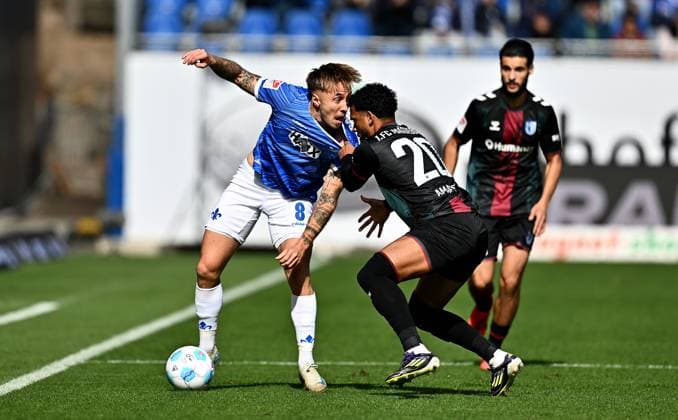 28.09.2024, xfux, Fussball 2.Bundesliga, SV Darmstadt 98 - 1.FC Magdeburg, v.l. Luca Marseiler (SV Darmstadt 98), Xavier Amaechi (1.FC Magdeburg) (DFL DFB REGULATIONS PROHIBIT ANY USE OF PHOTOGRAPHS as IMAGE SEQUENCES and or QUASI-VIDEO. Eine Lizenzierung des Lichtbildwerkes an und oder durch den SV Darmstadt 1898 e.V. sowie Tochterunternehmen ist nicht gestattet. No release of or sale to SV Darmstadt 1898 e.V.)) Darmstadt