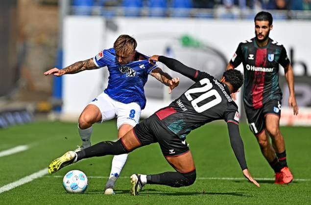 28.09.2024, xfux, Fussball 2.Bundesliga, SV Darmstadt 98 - 1.FC Magdeburg, v.l. Luca Marseiler (SV Darmstadt 98), Xavier Amaechi (1.FC Magdeburg) (DFL DFB REGULATIONS PROHIBIT ANY USE OF PHOTOGRAPHS as IMAGE SEQUENCES and or QUASI-VIDEO. Eine Lizenzierung des Lichtbildwerkes an und oder durch den SV Darmstadt 1898 e.V. sowie Tochterunternehmen ist nicht gestattet. No release of or sale to SV Darmstadt 1898 e.V.)) Darmstadt