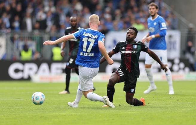 28.09.2024, xdcx, Fussball 2. Bundesliga, SV Darmstadt 98 - 1. FC Magdeburg, emonline, emspor, despor, v.l., Kai Klefisch (SV Darmstadt 98), Daniel Heber (1. FC Magdeburg) DFL DFB REGULATIONS PROHIBIT ANY USE OF PHOTOGRAPHS AS IMAGE SEQUENCES AND OR QUASI-VIDEO.