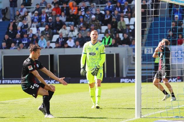 28.09.2024, xtvx, Fussball 2.Bundesliga, SV Darmstadt 98 - 1.FC Magdeburg emspor, v.l. Martijn Kaars (1. FC Magdeburg) Torwart Marcel Schuhen (SV Darmstadt 98) Connor Krempicki (1. FC Magdeburg) Portrait (DFL DFB REGULATIONS PROHIBIT ANY USE OF PHOTOGRAPHS as IMAGE SEQUENCES and or QUASI-VIDEO) Darmstadt