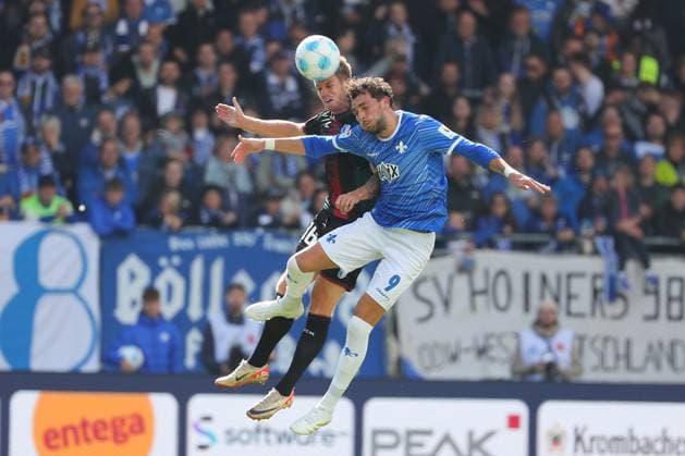 28.09.2024, xtvx, Fussball 2.Bundesliga, SV Darmstadt 98 - 1.FC Magdeburg emspor, v.l. Marcus Mathisen (1. FC Magdeburg) Fraser Hornby (SV Darmstadt 98) Zweikampf, Duell, duel, tackle, compete (DFL DFB REGULATIONS PROHIBIT ANY USE OF PHOTOGRAPHS as IMAGE SEQUENCES and or QUASI-VIDEO) Darmstadt