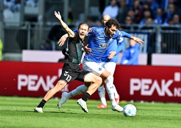 28.09.2024, xfux, Fussball 2.Bundesliga, SV Darmstadt 98 - 1.FC Magdeburg, v.l. Connor Krempicki (1.FC Magdeburg), Fraser Hornby (SV Darmstadt 98) (DFL DFB REGULATIONS PROHIBIT ANY USE OF PHOTOGRAPHS as IMAGE SEQUENCES and or QUASI-VIDEO. Eine Lizenzierung des Lichtbildwerkes an und oder durch den SV Darmstadt 1898 e.V. sowie Tochterunternehmen ist nicht gestattet. No release of or sale to SV Darmstadt 1898 e.V.)) Darmstadt