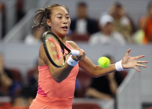 (240928) -- BEIJING, Sept. 28, 2024 -- Zheng Qinwen hits a return during the women s singles second round match between Zheng Qinwen of China and Kamilla Rakhimova of Russia at 2024 China Open tennis tournament in Beijing, capital of China, Sept. 28, 2024. ) (SP)CHINA-BEIJING-TENNIS-CHINA OPEN-WOMEN S SINGLES (CN) ZhangxChenlin 