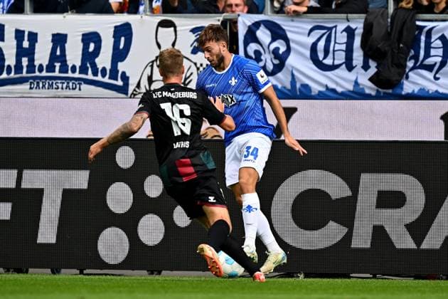 28.09.2024, xfux, Fussball 2.Bundesliga, SV Darmstadt 98 - 1.FC Magdeburg, v.l. Marcus Mathisen (1.FC Magdeburg), Killian Corredor (SV Darmstadt 98) (DFL DFB REGULATIONS PROHIBIT ANY USE OF PHOTOGRAPHS as IMAGE SEQUENCES and or QUASI-VIDEO. Eine Lizenzierung des Lichtbildwerkes an und oder durch den SV Darmstadt 1898 e.V. sowie Tochterunternehmen ist nicht gestattet. No release of or sale to SV Darmstadt 1898 e.V.)) Darmstadt
