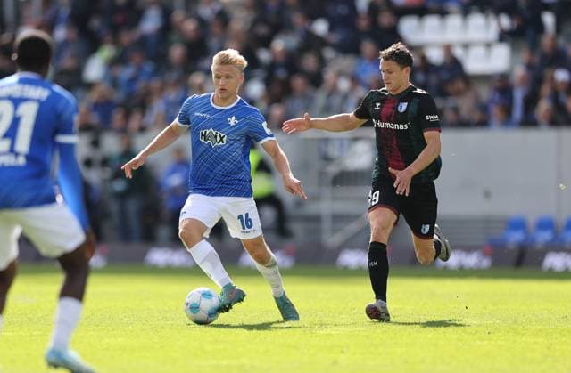 28.09.2024, xdcx, Fussball 2. Bundesliga, SV Darmstadt 98 - 1. FC Magdeburg, emonline, emspor, despor, v.l., Andreas Müller (SV Darmstadt 98), Martijn Kaars (1. FC Magdeburg) DFL DFB REGULATIONS PROHIBIT ANY USE OF PHOTOGRAPHS AS IMAGE SEQUENCES AND OR QUASI-VIDEO.