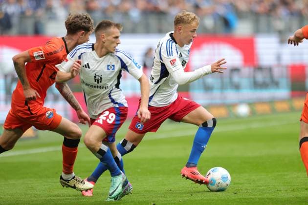 GER,Hamburg, Fussball, DFB, Hamburger SV vs SC Paderborn, im Hamburger Volksparkstadion , 28.09.2024, v.l. Emir Sahiti (Hamburger SV) Adam Karabec (Hamburger SV) DFL regulations prohibit any use of photographs as image sequences and or quasi-video.
