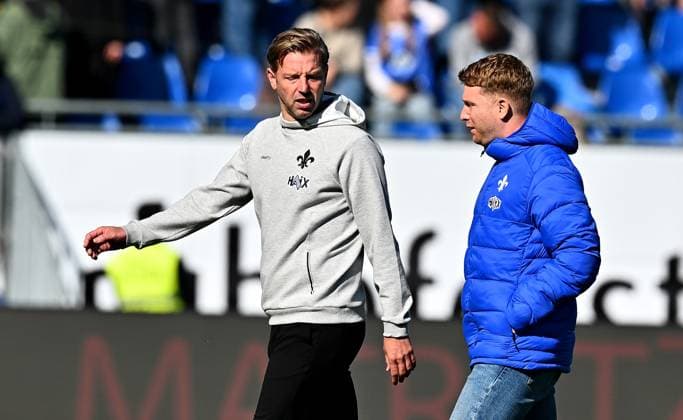 28.09.2024, xfux, Fussball 2.Bundesliga, SV Darmstadt 98 - 1.FC Magdeburg, v.l. Trainer Florian Kohfeldt (SV Darmstadt 98), Sportlicher Leiter Sportdirektor Paul Fernie (SV Darmstadt 98) (DFL DFB REGULATIONS PROHIBIT ANY USE OF PHOTOGRAPHS as IMAGE SEQUENCES and or QUASI-VIDEO. Eine Lizenzierung des Lichtbildwerkes an und oder durch den SV Darmstadt 1898 e.V. sowie Tochterunternehmen ist nicht gestattet. No release of or sale to SV Darmstadt 1898 e.V.)) Darmstadt