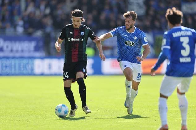 28.09.2024, xdcx, Fussball 2. Bundesliga, SV Darmstadt 98 - 1. FC Magdeburg, emonline, emspor, despor, v.l., Jean Hugonet (1. FC Magdeburg), Killian Corredor (SV Darmstadt 98) DFL DFB REGULATIONS PROHIBIT ANY USE OF PHOTOGRAPHS AS IMAGE SEQUENCES AND OR QUASI-VIDEO.