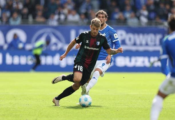 28.09.2024, xdcx, Fussball 2. Bundesliga, SV Darmstadt 98 - 1. FC Magdeburg, emonline, emspor, despor, v.l., Marcus Mathisen (1. FC Magdeburg), Fraser Hornby (SV Darmstadt 98) DFL DFB REGULATIONS PROHIBIT ANY USE OF PHOTOGRAPHS AS IMAGE SEQUENCES AND OR QUASI-VIDEO.
