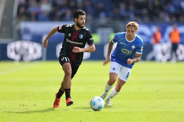 28.09.2024, xdcx, Fussball 2. Bundesliga, SV Darmstadt 98 - 1. FC Magdeburg, emonline, emspor, despor, v.l., Mohammed El Hankouri (1. FC Magdeburg), Luca Marseiler (SV Darmstadt 98) DFL DFB REGULATIONS PROHIBIT ANY USE OF PHOTOGRAPHS AS IMAGE SEQUENCES AND OR QUASI-VIDEO.