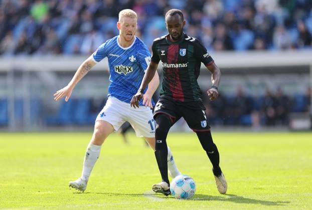 28.09.2024, xdcx, Fussball 2. Bundesliga, SV Darmstadt 98 - 1. FC Magdeburg, emonline, emspor, despor, v.l., Kai Klefisch (SV Darmstadt 98), Pierre Nadjombe (1. FC Magdeburg) DFL DFB REGULATIONS PROHIBIT ANY USE OF PHOTOGRAPHS AS IMAGE SEQUENCES AND OR QUASI-VIDEO.
