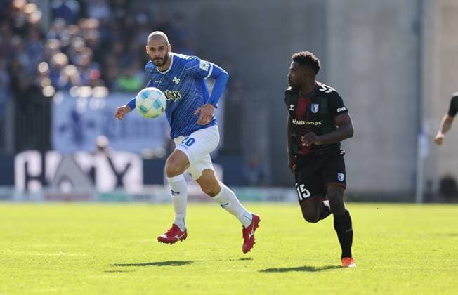 28.09.2024, xdcx, Fussball 2. Bundesliga, SV Darmstadt 98 - 1. FC Magdeburg, emonline, emspor, despor, v.l., Aleksandar Vukotic (SV Darmstadt 98), Daniel Heber (1. FC Magdeburg) DFL DFB REGULATIONS PROHIBIT ANY USE OF PHOTOGRAPHS AS IMAGE SEQUENCES AND OR QUASI-VIDEO.