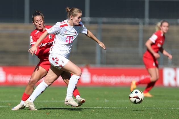 Selina Vobian (SC Freiburg) und Taylor Ziemer (1. FC Koeln) im Zweikampf waehrend des Spiels der 1. Frauen Bundesliga zwischen 1.FC Köln und SC Freiburg, Franz-Kremer-Stadion am 28. September 2024 in Köln, Deutschland. (Foto von Oliver Kaelke DeFodi Images) +++ Selina Vobian (SC Freiburg) und Taylor Ziemer (1. FC Koeln) battle for the ball during the Woman Bundesliga match between 1.FC Köln and SC Freiburg at Franz-Kremer-Stadion on September 28, 2024 in Köln, Germany. (Photo by Oliver Kaelke DeFodi Images) DFL regulations prohibit any use of photographs as image sequences and or quasi-video. Defodi-003_678_2024_09_28_OK_KOESCF_0691