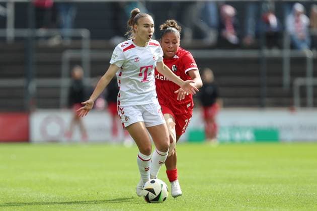 Alena Bienz (1. FC Koeln) und Nicole Ojukwu (SC Freiburg) im Zweikampf waehrend des Spiels der 1. Frauen Bundesliga zwischen 1.FC Köln und SC Freiburg, Franz-Kremer-Stadion am 28. September 2024 in Köln, Deutschland. (Foto von Oliver Kaelke DeFodi Images) +++ Alena Bienz (1. FC Koeln) und Nicole Ojukwu (SC Freiburg) battle for the ball during the Woman Bundesliga match between 1.FC Köln and SC Freiburg at Franz-Kremer-Stadion on September 28, 2024 in Köln, Germany. (Photo by Oliver Kaelke DeFodi Images) DFL regulations prohibit any use of photographs as image sequences and or quasi-video. Defodi-003_678_2024_09_28_OK_KOESCF_1272