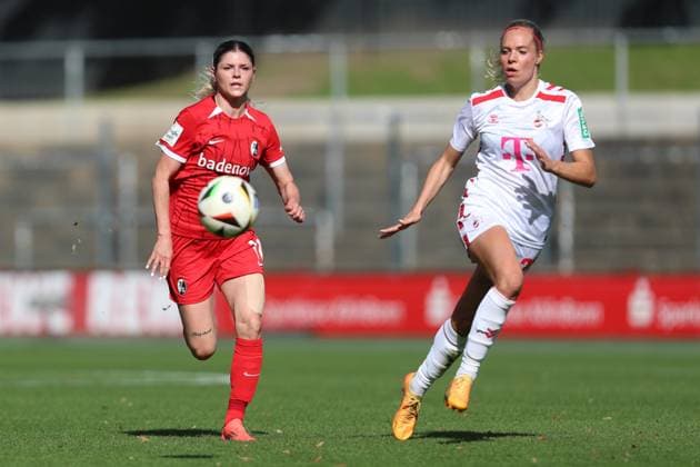 Eileen Campbell (SC Freiburg) und Janina Hechler (1. FC Koeln) im Zweikampf waehrend des Spiels der 1. Frauen Bundesliga zwischen 1.FC Köln und SC Freiburg, Franz-Kremer-Stadion am 28. September 2024 in Köln, Deutschland. (Foto von Oliver Kaelke DeFodi Images) +++ Eileen Campbell (SC Freiburg) und Janina Hechler (1. FC Koeln) battle for the ball during the Woman Bundesliga match between 1.FC Köln and SC Freiburg at Franz-Kremer-Stadion on September 28, 2024 in Köln, Germany. (Photo by Oliver Kaelke DeFodi Images) DFL regulations prohibit any use of photographs as image sequences and or quasi-video. Defodi-003_678_2024_09_28_OK_KOESCF_0599