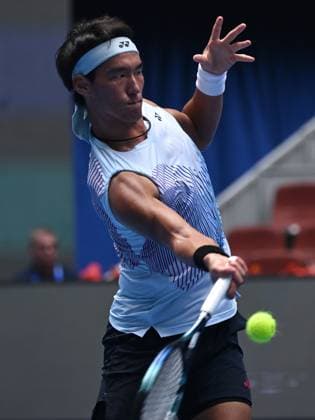 (240929) -- BEIJING, Sept. 29, 2024 -- Bu Yunchaokete hits a return during the men s singles second round match between Bu Yunchaokete of China and Lorenzo Musetti of Italy at 2024 China Open tennis tournament in Beijing, capital of China, Sept. 29, 2024. ) (SP)CHINA-BEIJING-TENNIS-CHINA OPEN-MEN S SINGLES (CN) ZhangxLong 