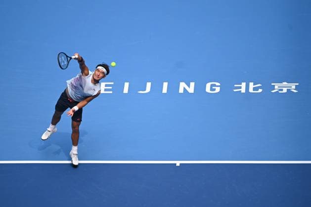 (240929) -- BEIJING, Sept. 29, 2024 -- Bu Yunchaokete serves during the men s singles second round match between Bu Yunchaokete of China and Lorenzo Musetti of Italy at 2024 China Open tennis tournament in Beijing, capital of China, Sept. 29, 2024. ) (SP)CHINA-BEIJING-TENNIS-CHINA OPEN-MEN S SINGLES (CN) ZhangxLong 