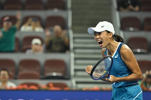 (240929) -- BEIJING, Sept. 29, 2024 -- Zhang Shuai celebrates scoring during the women s singles third round match between Zhang Shuai of China and Greet Minnen of Belgium at 2024 China Open tennis tournament in Beijing, capital of China, Sept. 29, 2024. ) (SP)CHINA-BEIJING-TENNIS-CHINA OPEN-WOMEN S SINGLES (CN) ZhangxLong 