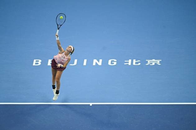 (240929) -- BEIJING, Sept. 29, 2024 -- Greet Minnen serves during the women s singles third round match between Zhang Shuai of China and Greet Minnen of Belgium at 2024 China Open tennis tournament in Beijing, capital of China, Sept. 29, 2024. ) (SP)CHINA-BEIJING-TENNIS-CHINA OPEN-WOMEN S SINGLES (CN) ZhangxLong 